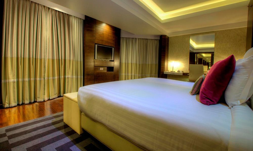 Avari Towers Karachi Exterior foto A bedroom at the hotel